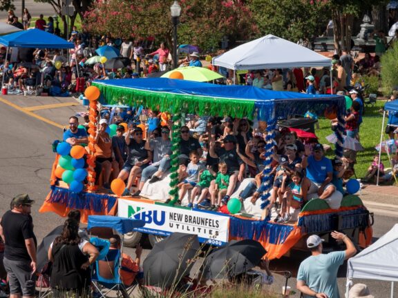 Picture of New Braunfels Utilities involved in a community parade.