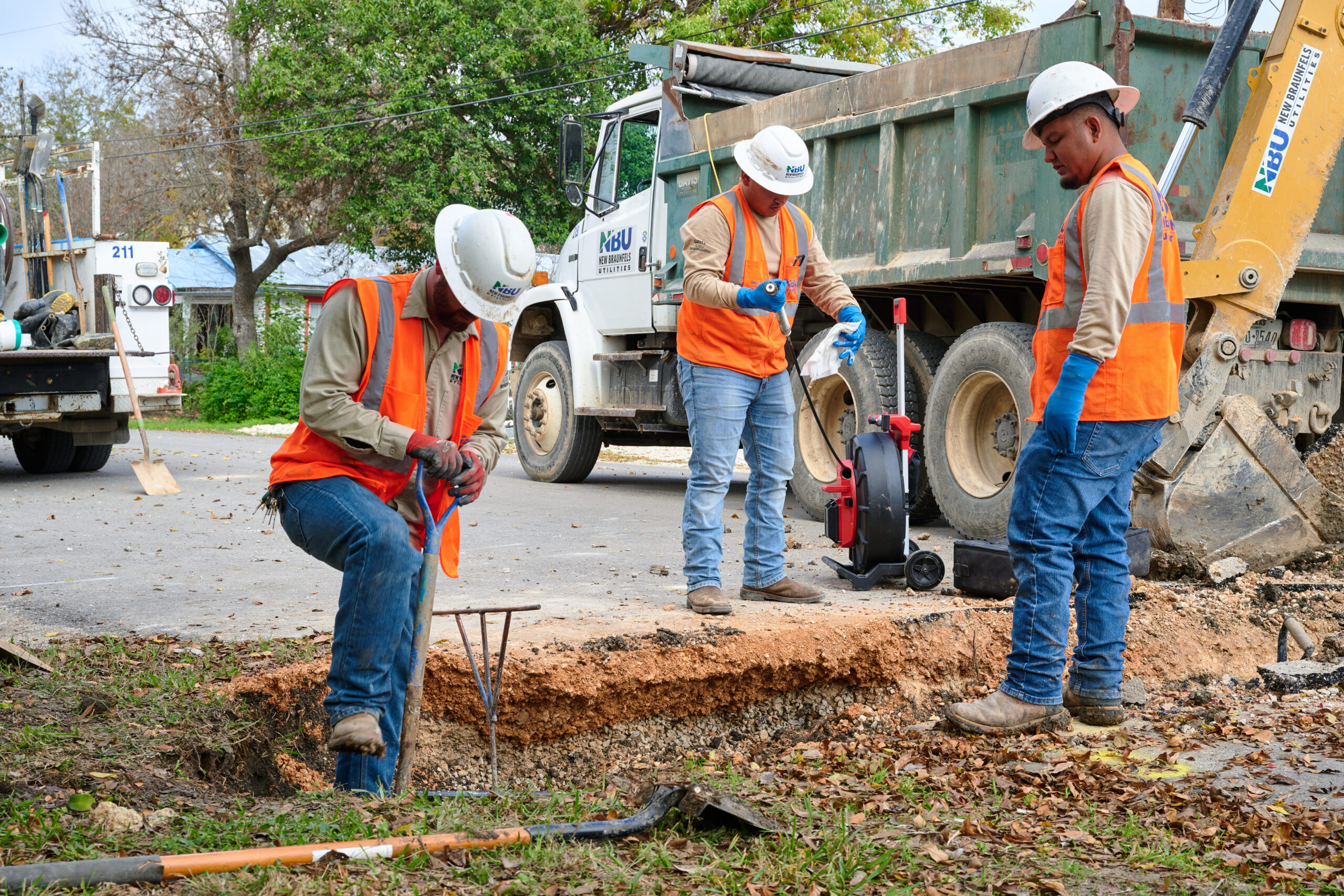 NBU water operations working on a sewer line.