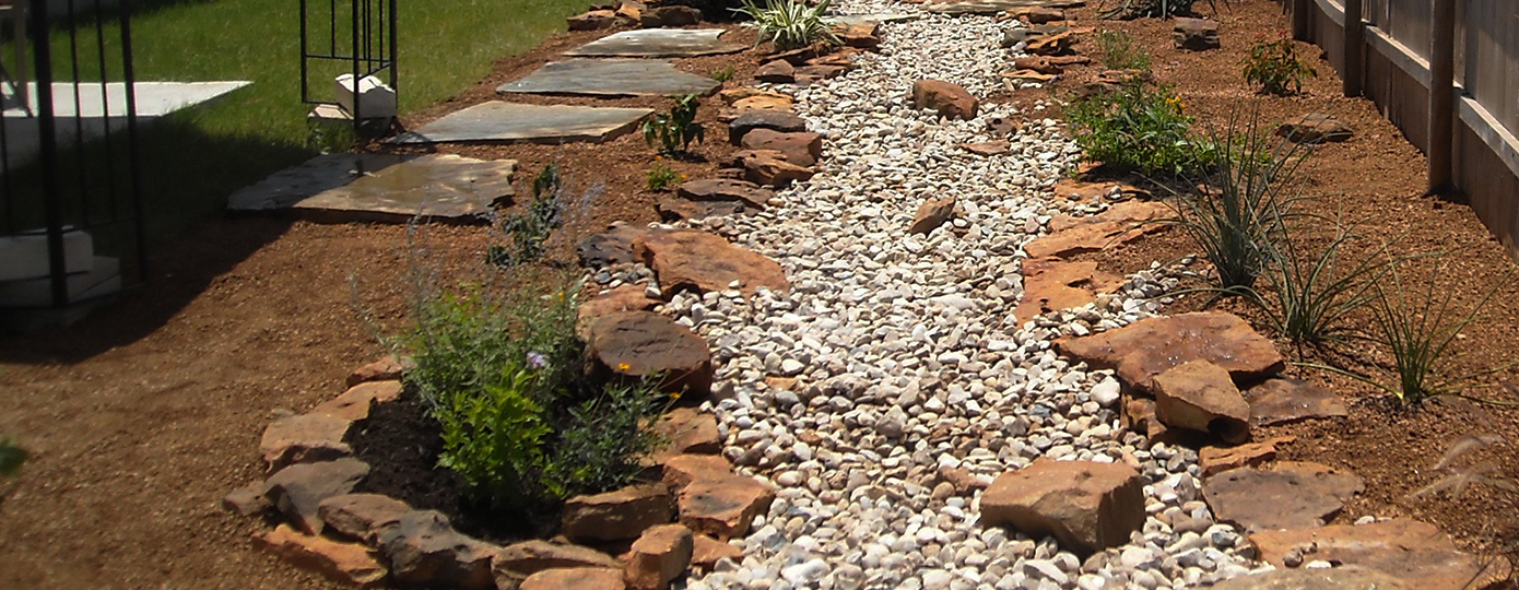 Image of a Texas backyard with native plants and xeriscape.