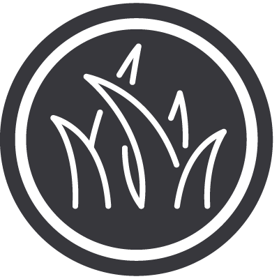 Black and white icon featuring a circle with stylized grass blades in the center.