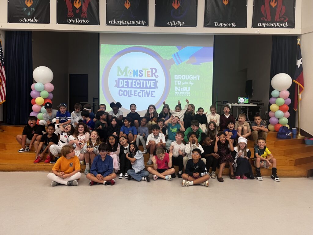 Monster detective class posing for the camera after a presentation at County Line Elementary School