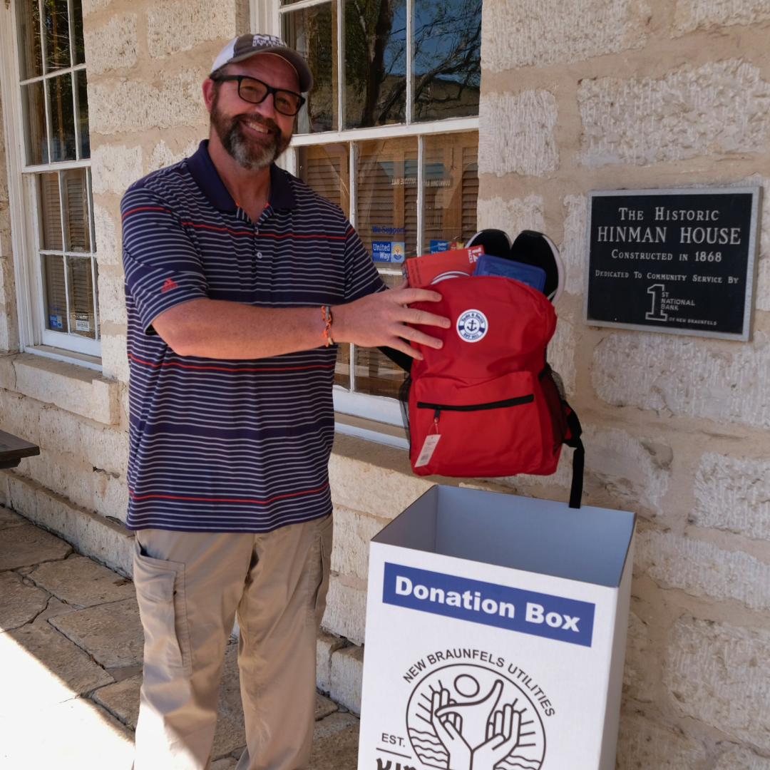 Man dropping off donations for Kinderkraft