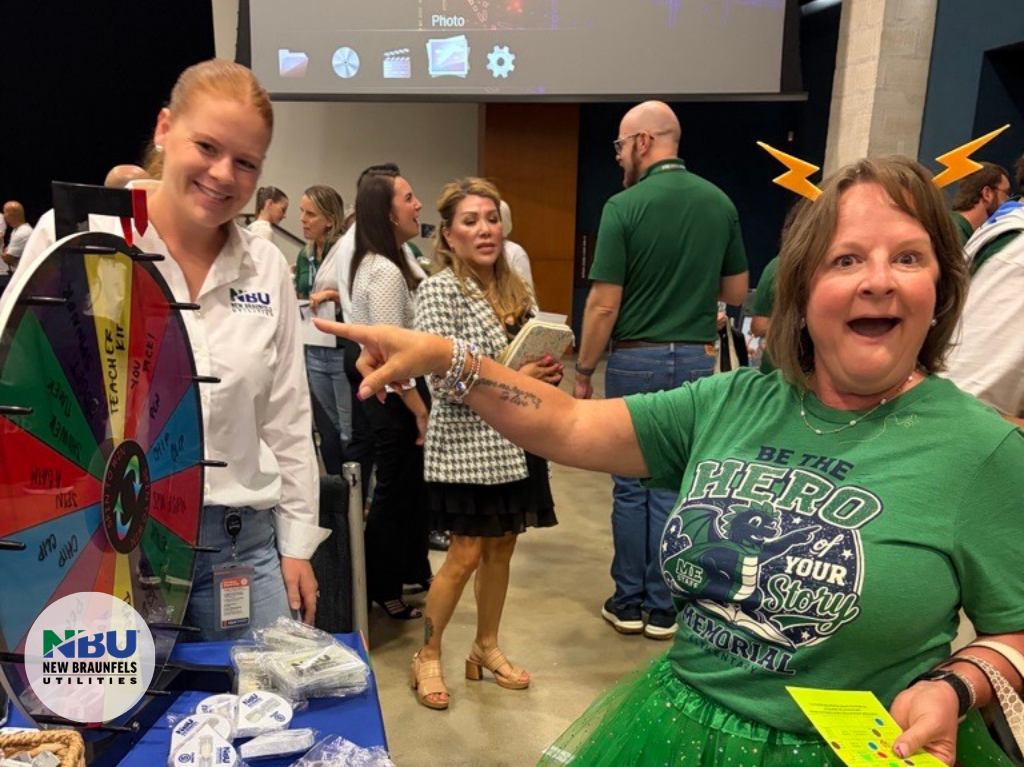 NBISD faculty and staff stop by NBU table and booth.